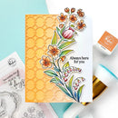 Card with floral design and 'Always here for you' text, surrounded by stamping tools on a light blue background.