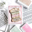 Decorative stamp set with '100% Handmade' and 'Just for You' text on a pink card, surrounded by other stamps and floral elements.