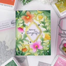 Floral card with 'You're so thoughtful' message surrounded by craft supplies on a white background