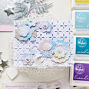 Card with floral designs and 'Sweetest Thanks' text, surrounded by craft supplies.