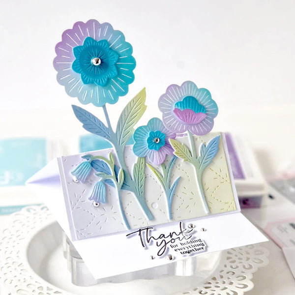 Card with floral design and 'Thank you' message on a white background