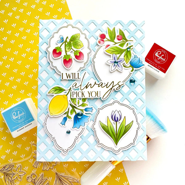 Card with floral and fruit designs on a yellow background