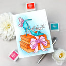 Greeting card with a blue high heel shoe and gift box design, surrounded by flowers and stamps.