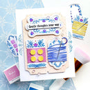 Card with decorative elements and text on a blue textured background