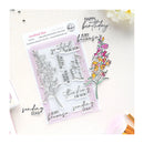 Clear stamp set with floral designs and text on a white background
