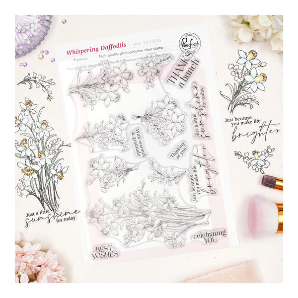 Clear stamp set with floral designs and sentiments on a white background
