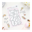 Clear stamp set with floral and text designs on a white background