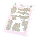 Set of metal stamps with various phrases on a pink background