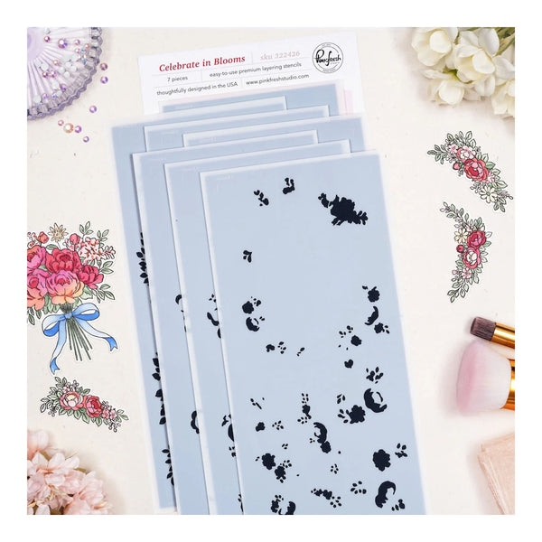 Set of floral and paw print stencils on a light blue background with decorative elements.