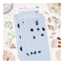 Set of temporary tattoos with floral designs on a white background