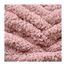 Close-up of a pink textured fabric