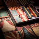 Circus-themed puzzle with a person standing on a colorful puzzle piece.