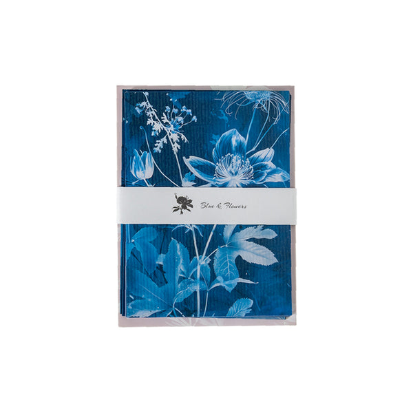 Pack of napkins with blue floral design on a white background