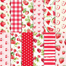 Collection of red and pink patterned paper designs featuring fruits and polka dots.