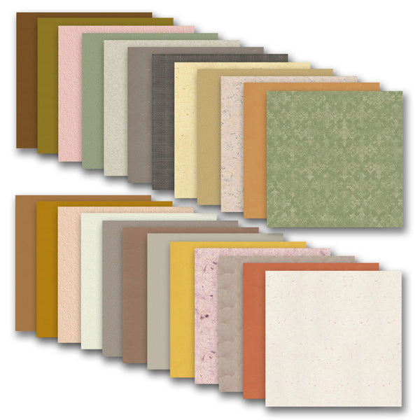 Collection of textured paper sheets in various colors on a white background