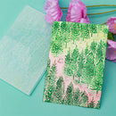 Green and pink textured paper with a floral background