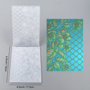 Two embossed paper sheets with floral design and measurements on a gray background