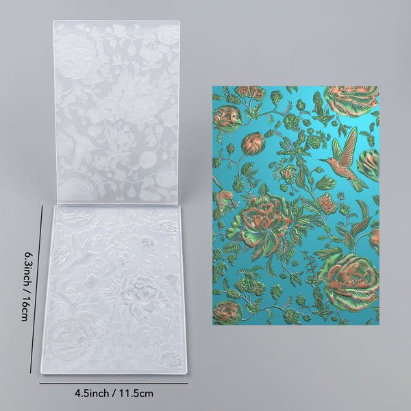 Two decorative paper sheets with floral patterns and measurements on a gray background