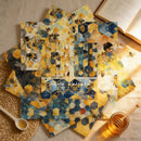 Set of honeycomb-patterned napkins with bee design on a textured surface.