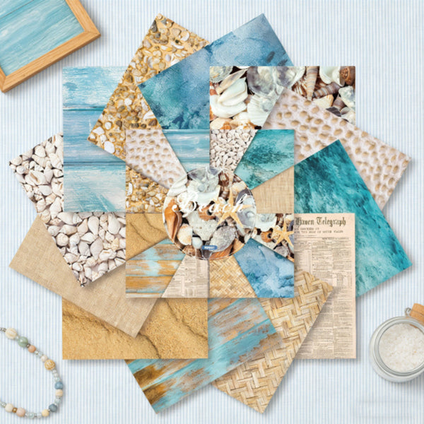 Collection of textured paper sheets with beach theme on a light blue background