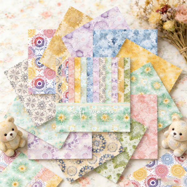 Collection of colorful patterned paper sheets on a soft background with small teddy bears.