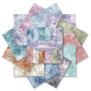 Set of scrapbooking paper sheets with a variety of textured patterns in pastel colors, displayed on a white background.