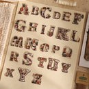 Alphabet letters on a wooden board with a decorative theme