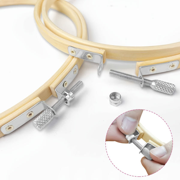 Metal nail clipper with wooden handle on a white background