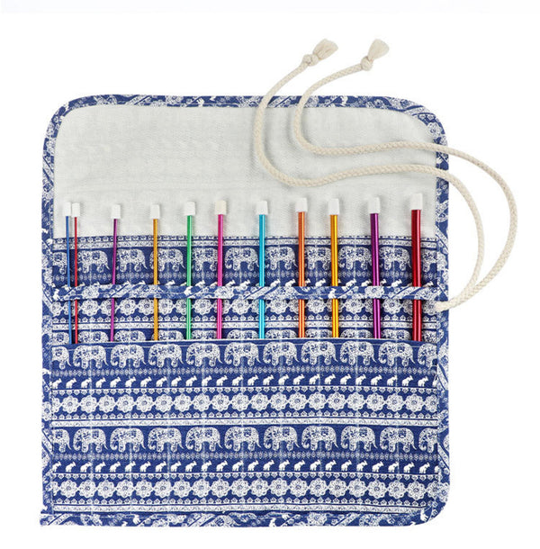 Knitting needle case with colorful needles and elephant pattern on a white background