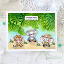 Card with cartoon animals and tropical leaves, featuring text 'Friends make summer shine'.