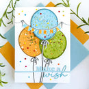 Colorful birthday card with balloons and text on a geometric background