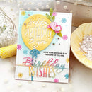 Colorful birthday card with decorative elements on a light background