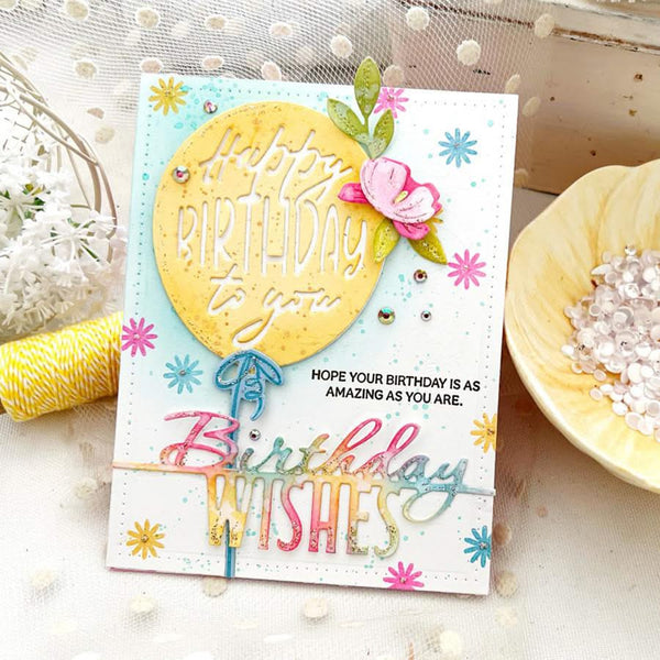 Colorful birthday card with decorative elements on a light background