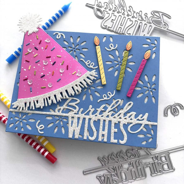 Handmade birthday card with decorative elements and cutting dies on a white background
