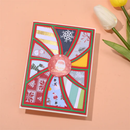 Colorful patterned card with a circular design on a peach background
