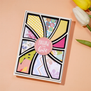 Colorful card with geometric design and 'Follow your heart' message on a peach background