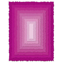 Stack of pink scalloped paper layers on a white background