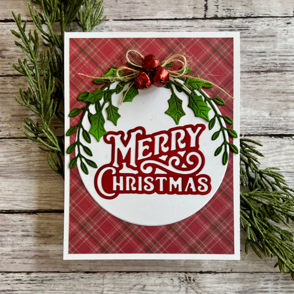 Christmas card with wreath and 'Merry Christmas' text on a red plaid background