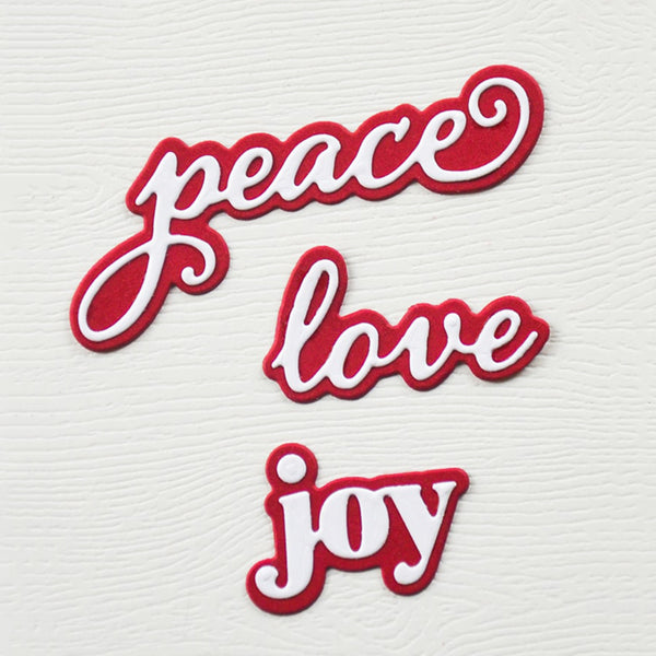 Red and white 'peace love joy' text patches on a textured white background