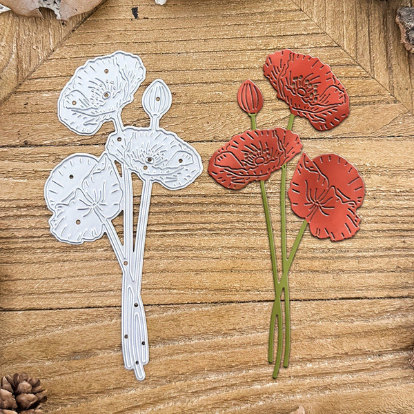Metal flower cutting dies on a wooden surface