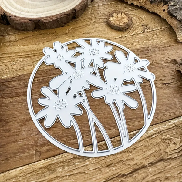 Metal floral cutting die on a wooden surface