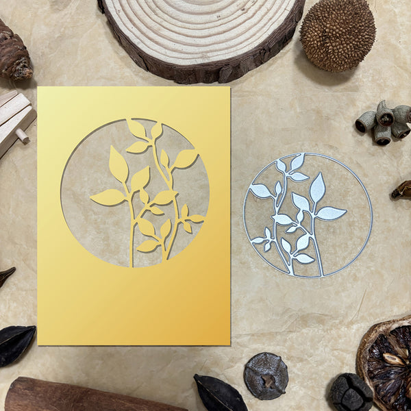 Yellow card with leaf design on a textured surface with natural elements