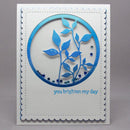 Card with blue leaf design and 'you brighten my day' text on a gray background