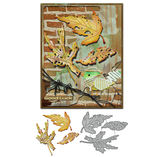 Decorative card with leaf designs and a small bird, accompanied by metal leaf cutouts.