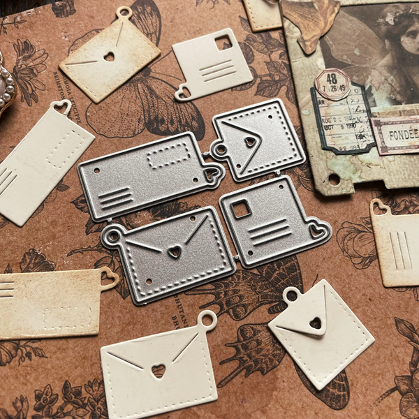Metal and beige enamel jewelry components on a textured brown background