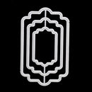 Decorative metal cutting dies with a geometric design on a black background