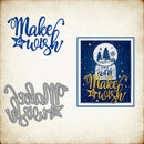 Decorative cutout with 'Make a wish' text and snow globe design on a textured background.