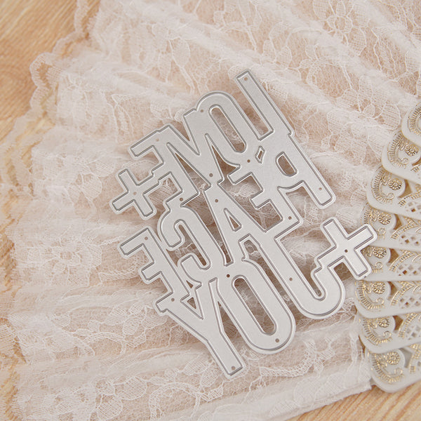 Metal die cut with text on a lace background