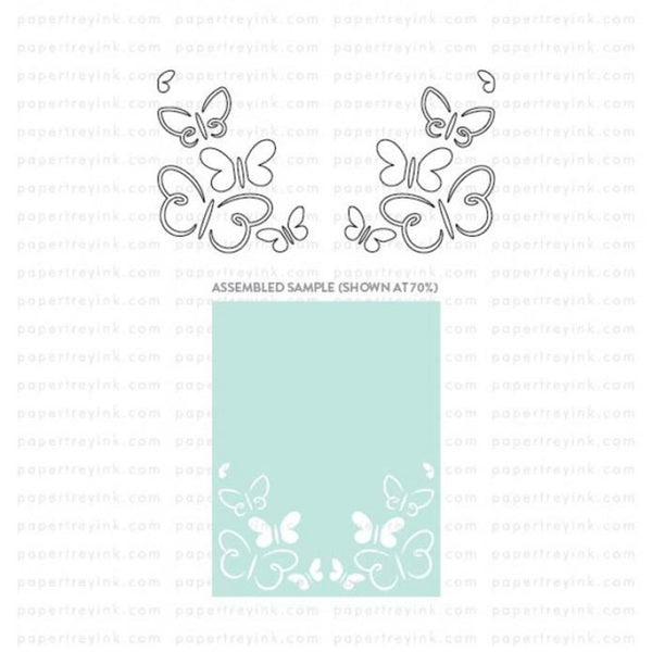 Butterfly patterned paper with a sample on a light blue background