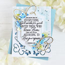 Decorative card with floral designs and a Bible verse on a light background